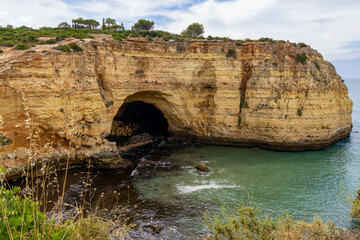 Caves in the sandstone along the Algarve coast, Portugal