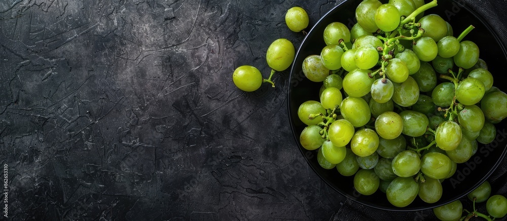 Poster close-up top view of ripe, big, beautiful green grapes with a mix of sweet and sour flavors, making 