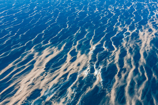 Aerial view of coral spawning in Great Barrier Reef, Queensland, Australia.