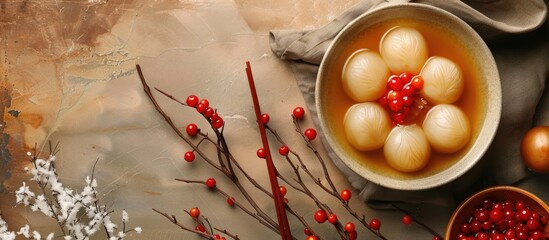 Enjoying large tangyuan yuanxiao in broth for Winter solstice festival, with a copy space image.