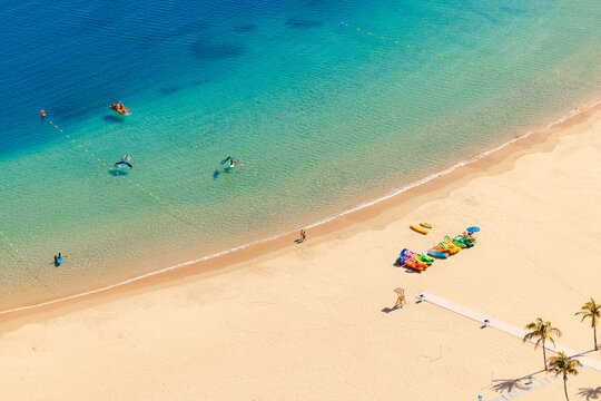 View of windsurfers on Playa de Las Teresitas, imported yellow sand beach, San Andres, Santa Cruz de Tenerife, Spain