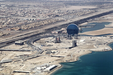 View of modern cityscape and waterfront, Abu Dhabi, United Arab Emirates.