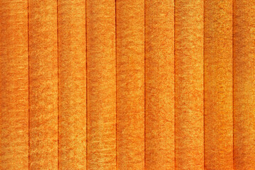 Fototapeta premium striped background: close up of orange textured wall
