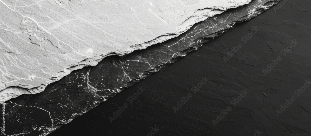 Poster Combining black slate and white marble stone textures creates an elegant backdrop for a copy space image.