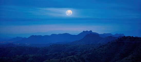 Fototapeta premium Moonlit Mountainscape