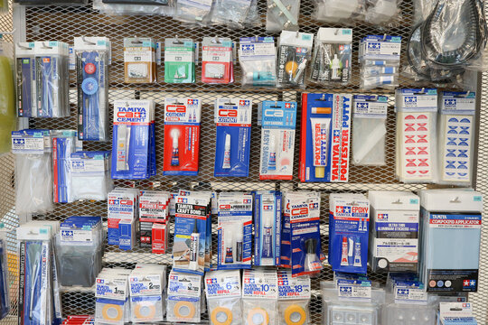 TOKYO, JAPAN - June 23, 2024: Glue, tape and other material for modeling in Tamiya Plamodel Factory Tokyo, a store in Tokyo's Shimbashi area.
