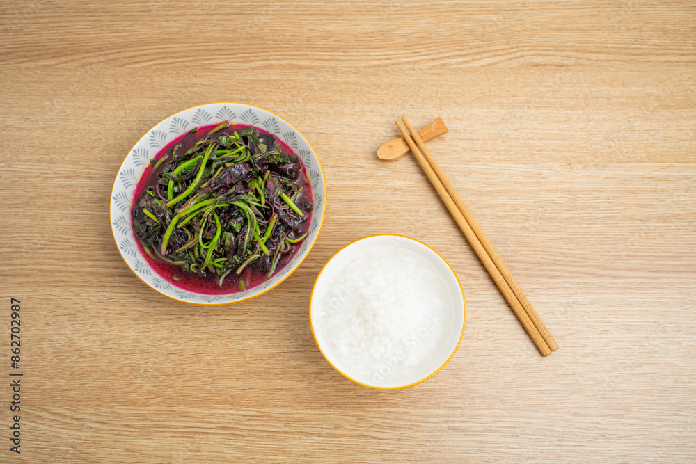 Wall mural Vegetarian diet meal fried red amaranth with white porridge