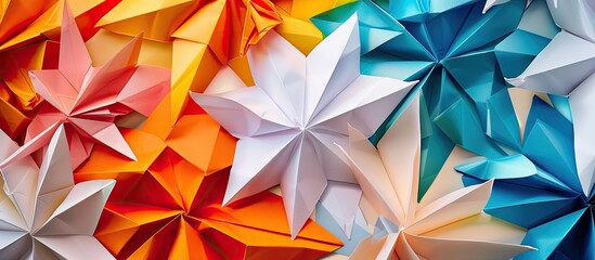 Vibrant origami patterns can enhance backgrounds, graphics, and abstract concepts, providing a colorful backdrop with copy space for text.