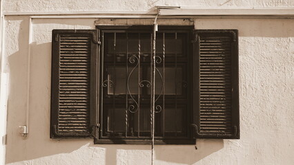 Vintage Window With Wrought Iron Detail Sepia Horizontal Shot