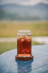 Fresh drink of iced tea mixed with mango.