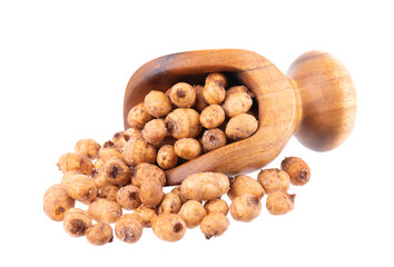Tiger nuts in wooden scoop, isolated on white background. Pile of chufa nuts, earth almond or chufa sedge. Cyperus esculentus.