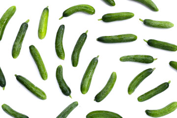 Mini cucumbers on white background.