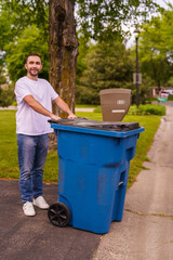 Caucasian Man is throwing away next to His House.