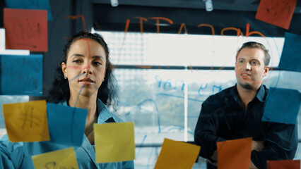 Professional business people discuss about creative marketing idea in modern office. Business team...