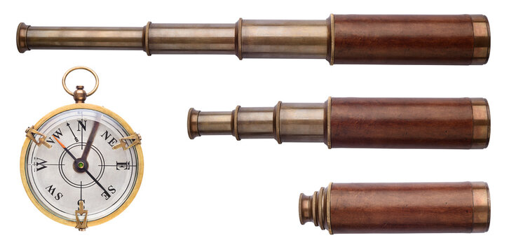 Old telescope, telescope tube, telescope pipe and compass isolated on white. Excellent objects on the theme of pirates, sea adventures, travel, etc.