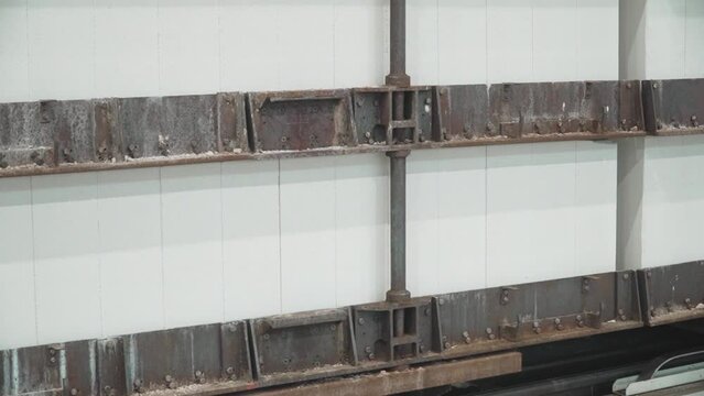 A trolley with a stack of dried aerated concrete blocks