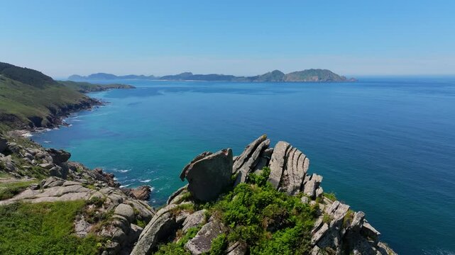Aerial View of the North Atlantic Ocean In Summer From Donon, Cangas, Spain. - pullback shot