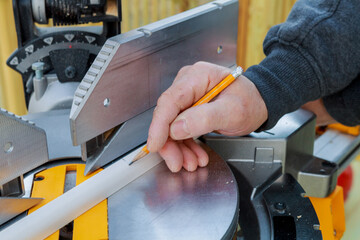 Cutting wooden moldings on circular saw before installing them is form of using circular saw by contractor