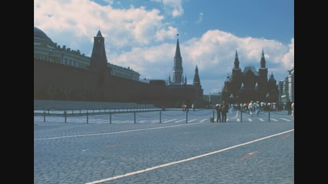 Moscow, Russia - 1985: Red Square with Kremlin complex, Senatskaja tower, and Nikolskaya tower. The State Historical Museum and the GUM State Department Store. Archival of Russia in Moscow in 1980s.