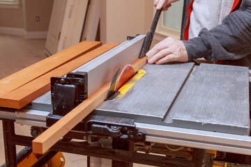 Cutting wood cabinet filler on an electric table saw