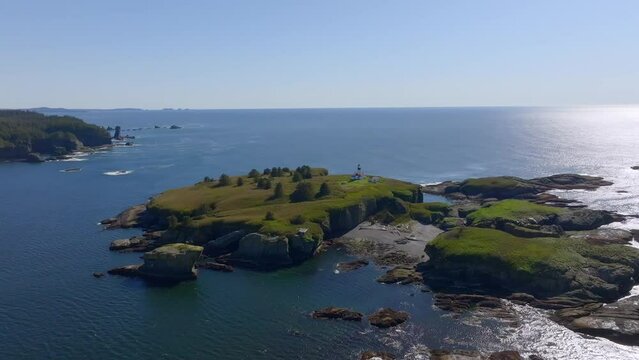Aerial view of Cape Flattery Lighthouse and rocky coastline, Pacific Ocean, Cape Flattery, Washington, United States.