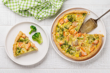 Homemade pie with salmon and broccoli
