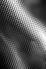 Glossy titanium surface with simple pattern for smartphone background. 