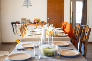 table with dishes and cutlery ready for lunch no people horizontal view