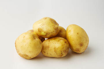 Young potatoes isolated on white background