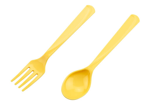 Yellow plastic spoon with fork isolated on white background with clipping path.