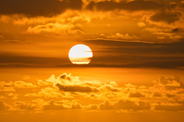 Beautiful golden sunset at the beau vallon beach, red sky, Mahe Seychelles