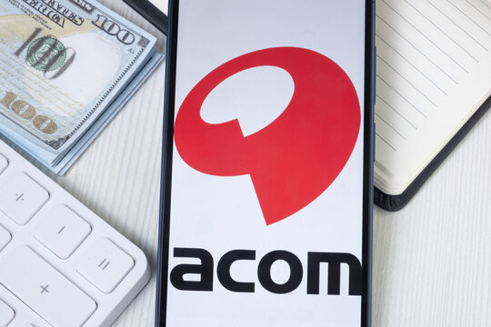 New York, USA - 21 June 2024: acom Logo on Phone Screen, Company Icon