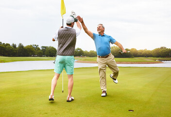Men, golf and win with high five for sport, field as member in club for health, wellness or...