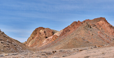 Colored sandy soil of hills over background of blue sky in Charyn Canyon National Park in Kazakhstan