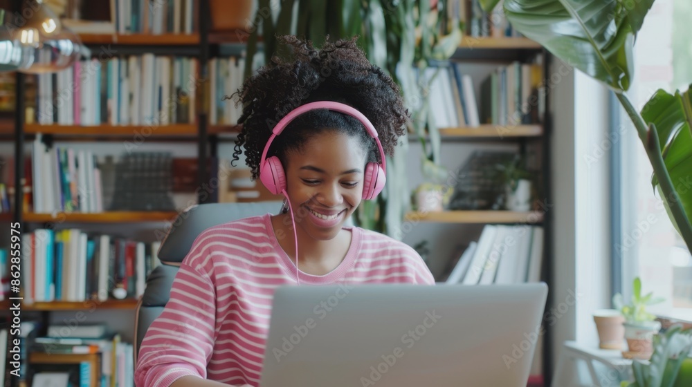 Wall mural the woman in pink headphones