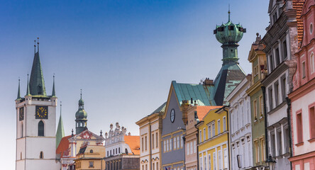 Colorful houses and tower of the All Saints church in Litomerice, Czechia