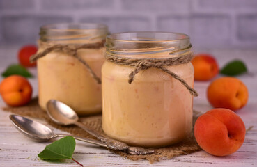 Apricot smoothie in jars. A refreshing summer drink.
