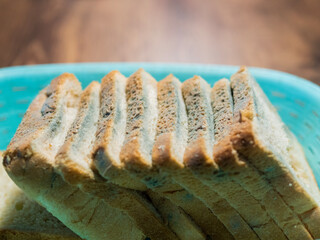 Slices of spoiled bread. Moldy bread cut into pieces