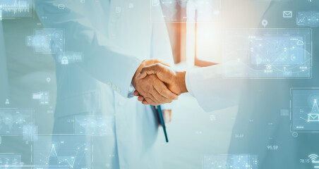 People in white coats shaking hands and digital data concept