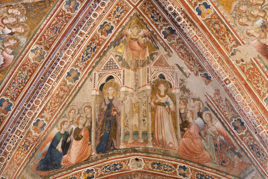 ASSISI, ITALY - MAY 17, 2024: The detail of gothic ceiling fresco - in the church Basilica di Santa Chiara by Giotto school - Maestro Espressionista di Santa Chiara (1337).