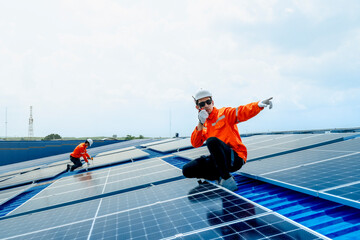 engineer man inspects construction of solar cell panel or photovoltaic cell by electronic device....