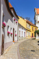 Colorful houses at a cobblestoned street in Znojmo, Czechia