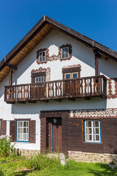 Traditional wood carving on a house in Volary, Czechia