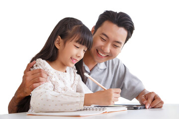 Children education and home school concept : Young asisn father pleased to see little daughters' study success. Excited smiling small child girl enjoying learning and writing on white background.