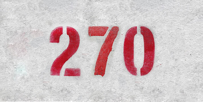 Red Number 270 on the white wall. Spray paint.