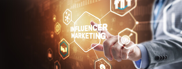 Man clicks on the inscription INFLUENCER MARKETING