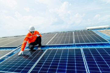 engineer man inspects construction of solar cell panel or photovoltaic cell by electronic device. Industrial Renewable energy of green power. factory worker working on tower roof.