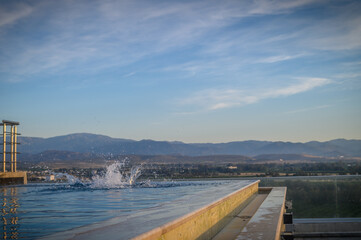 splashes of water in the rooftop pool 6