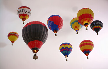 Fototapeta premium a colorful hot air balloon grounded on a ,white background,beauty