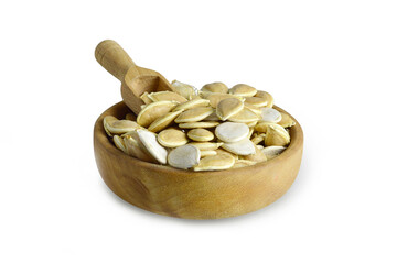 Bowl of pumpkin seeds isolated on white background